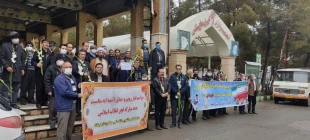 غبار رویی و گلباران مزار مطهر شهدا به مناسبت گرامیداشت 22 بهمن ماه توسط کارکنان دانشگاه فنی استان کرمانشاه 7